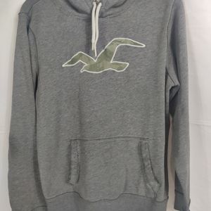 Hollister gray pull over sweatshirt with hood women's size medium